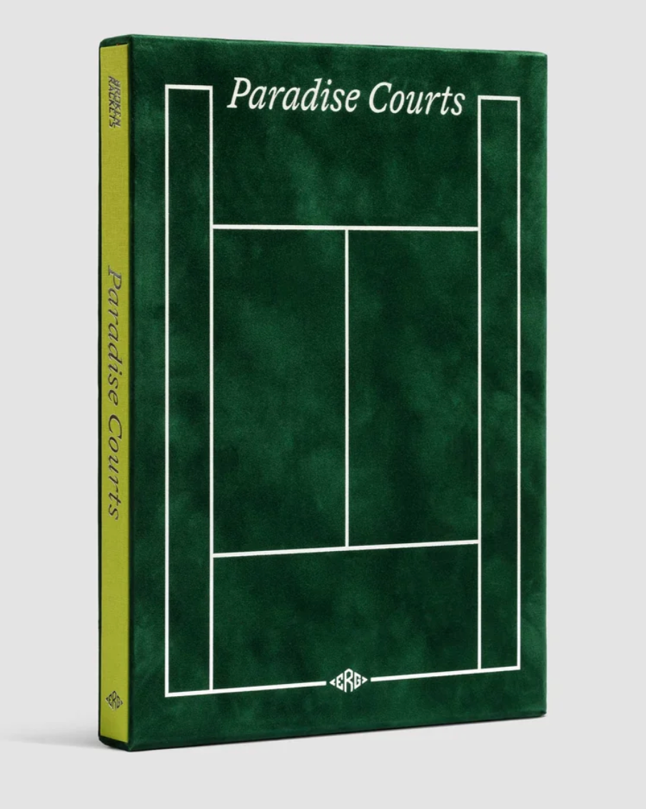 A hardcover book titled 'Paradise Courts' with a dark green tennis court line design on the cover and spine, photographed on a light gray background.