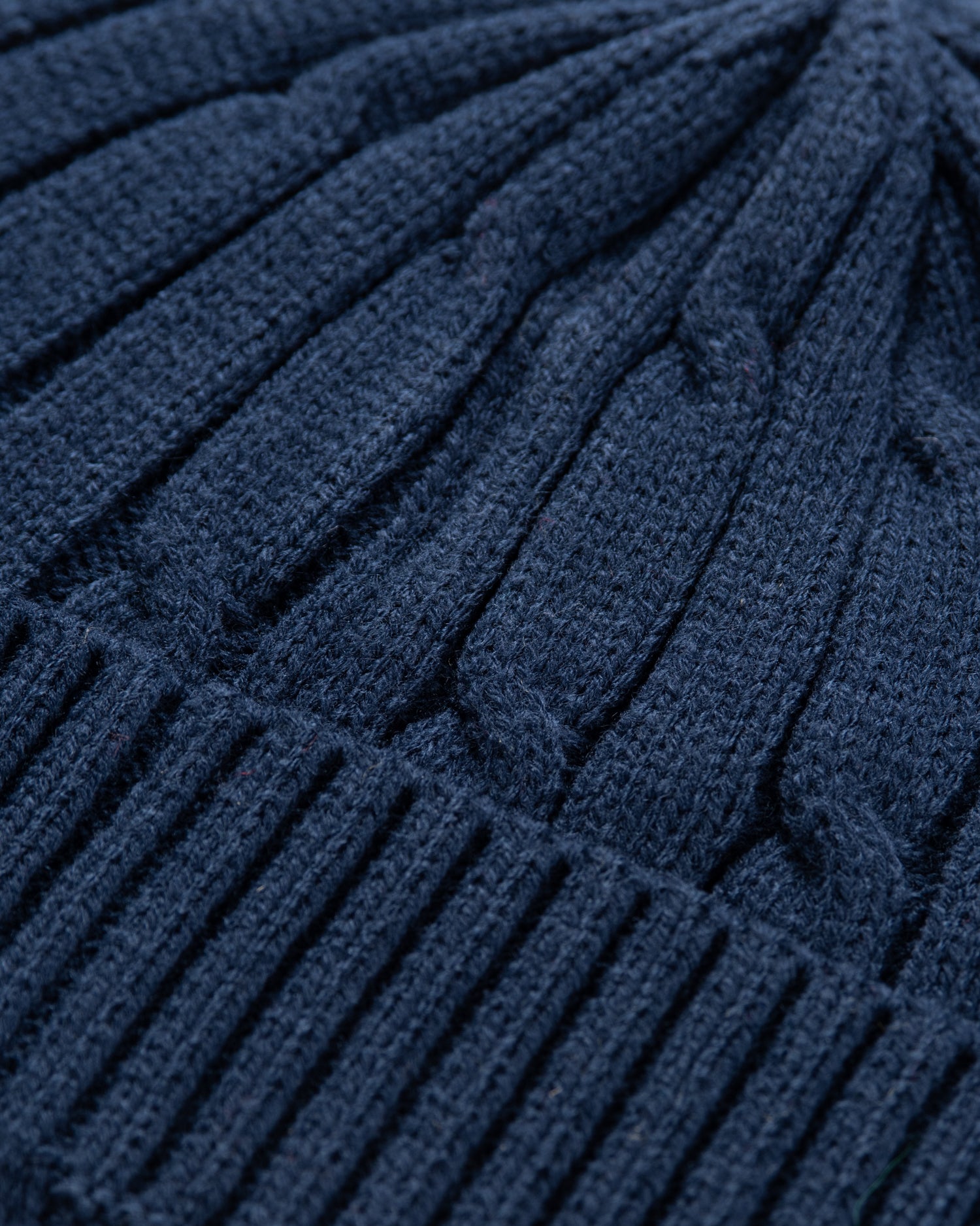 Close-up of a blue knitted fabric texture