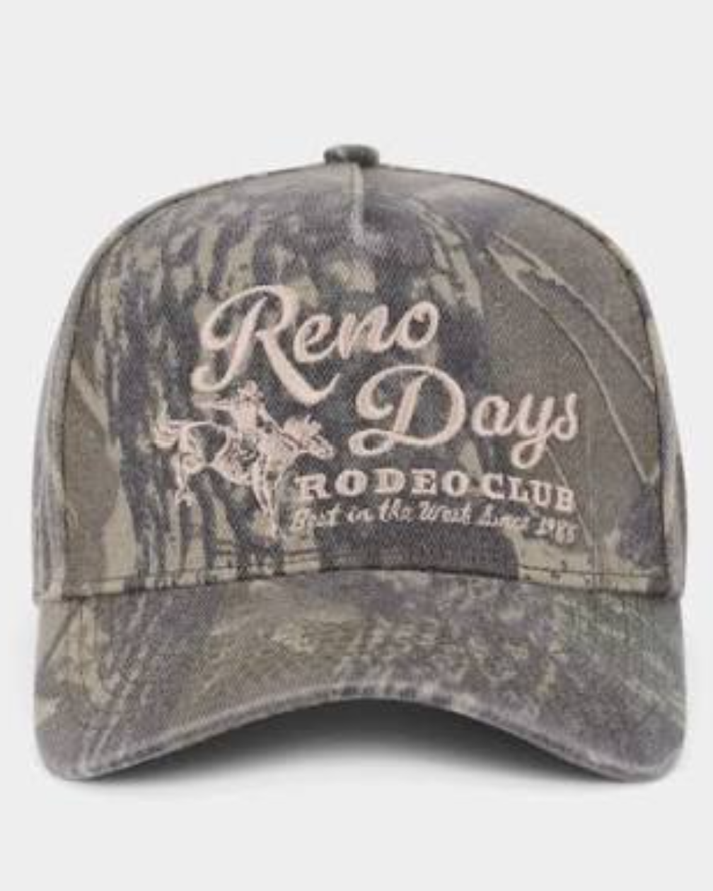 A baseball cap in a distressed camouflage pattern featuring the text 'Reno Days Rodeo Club' in a light beige script on the front.