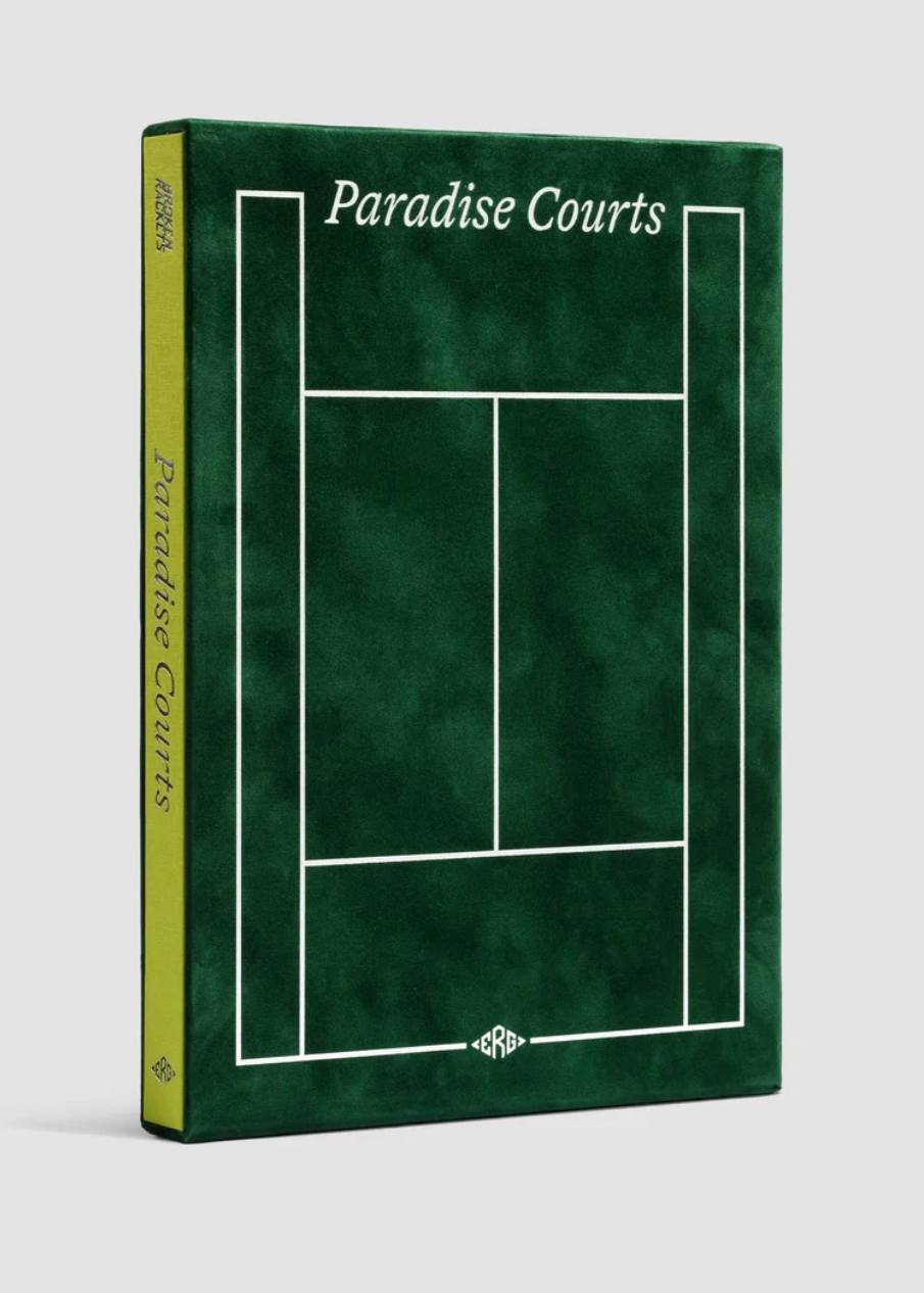 A hardcover book titled 'Paradise Courts' with a dark green tennis court line design on the cover and spine, photographed on a light gray background.
