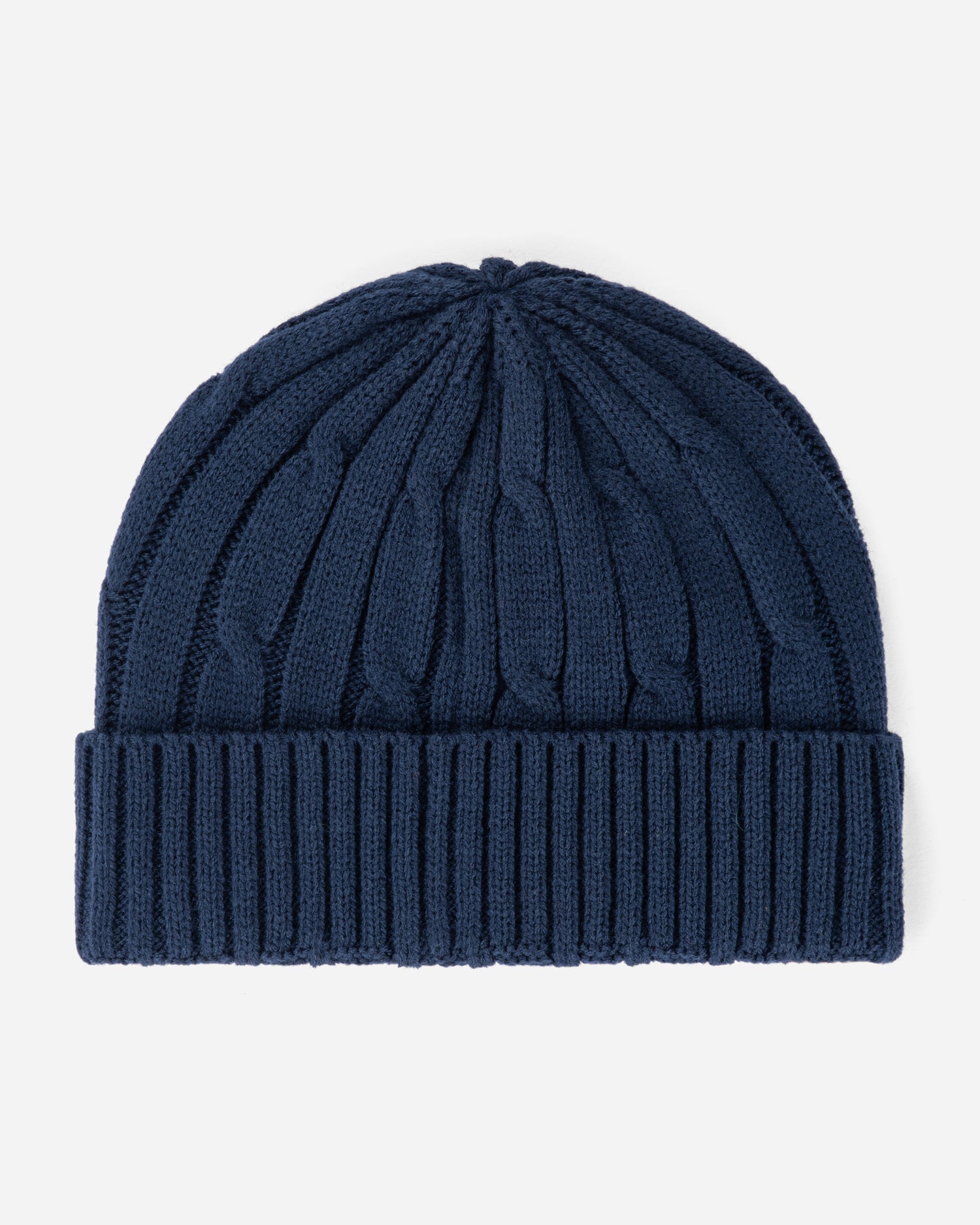 Blue knit beanie on a light gray background