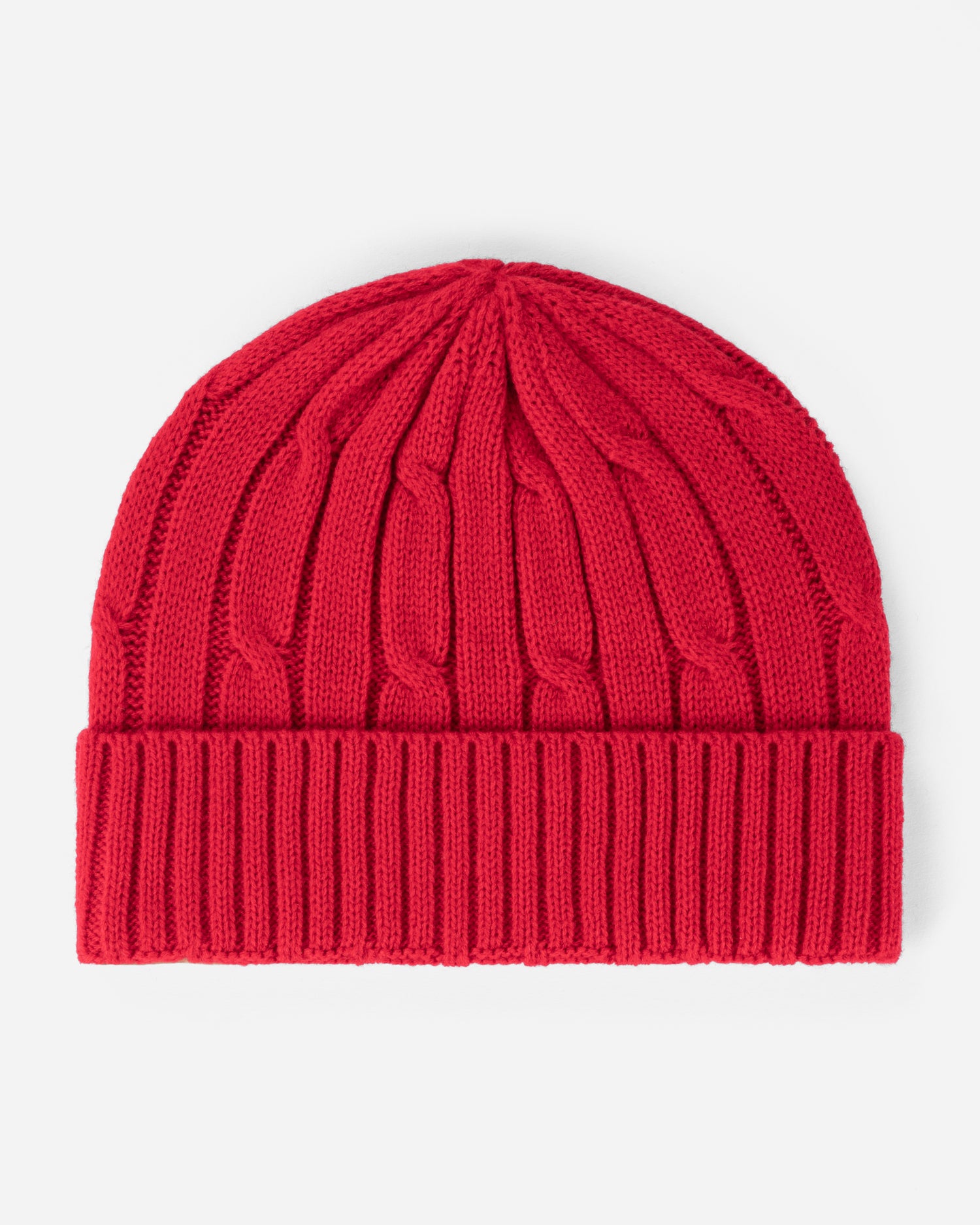 Red knit beanie on a light gray background