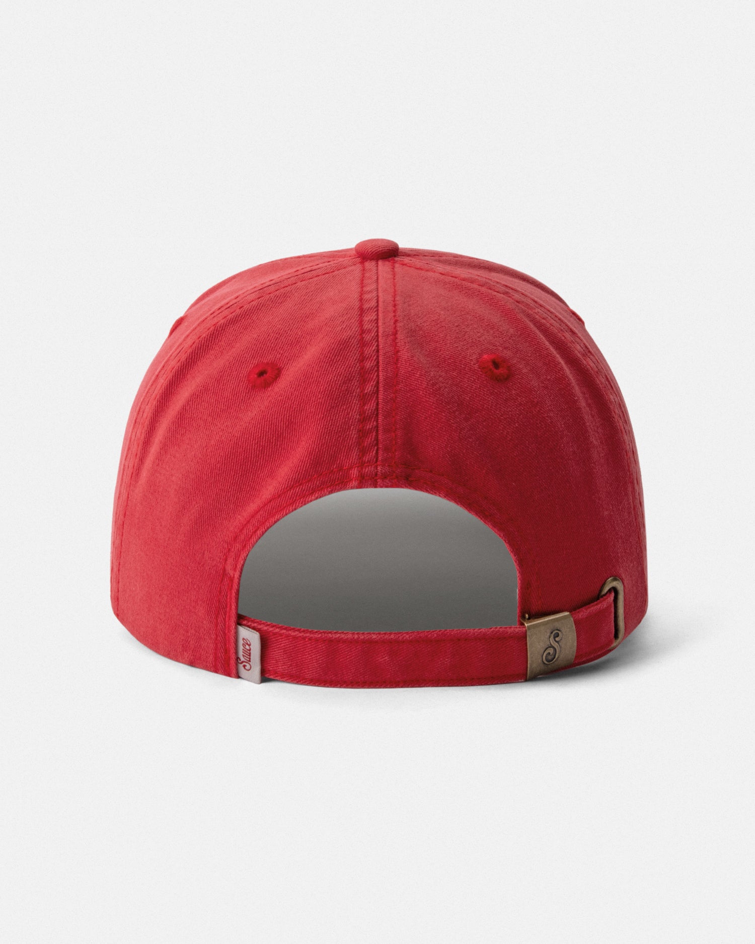 Red cap with a gray interior on a light gray background